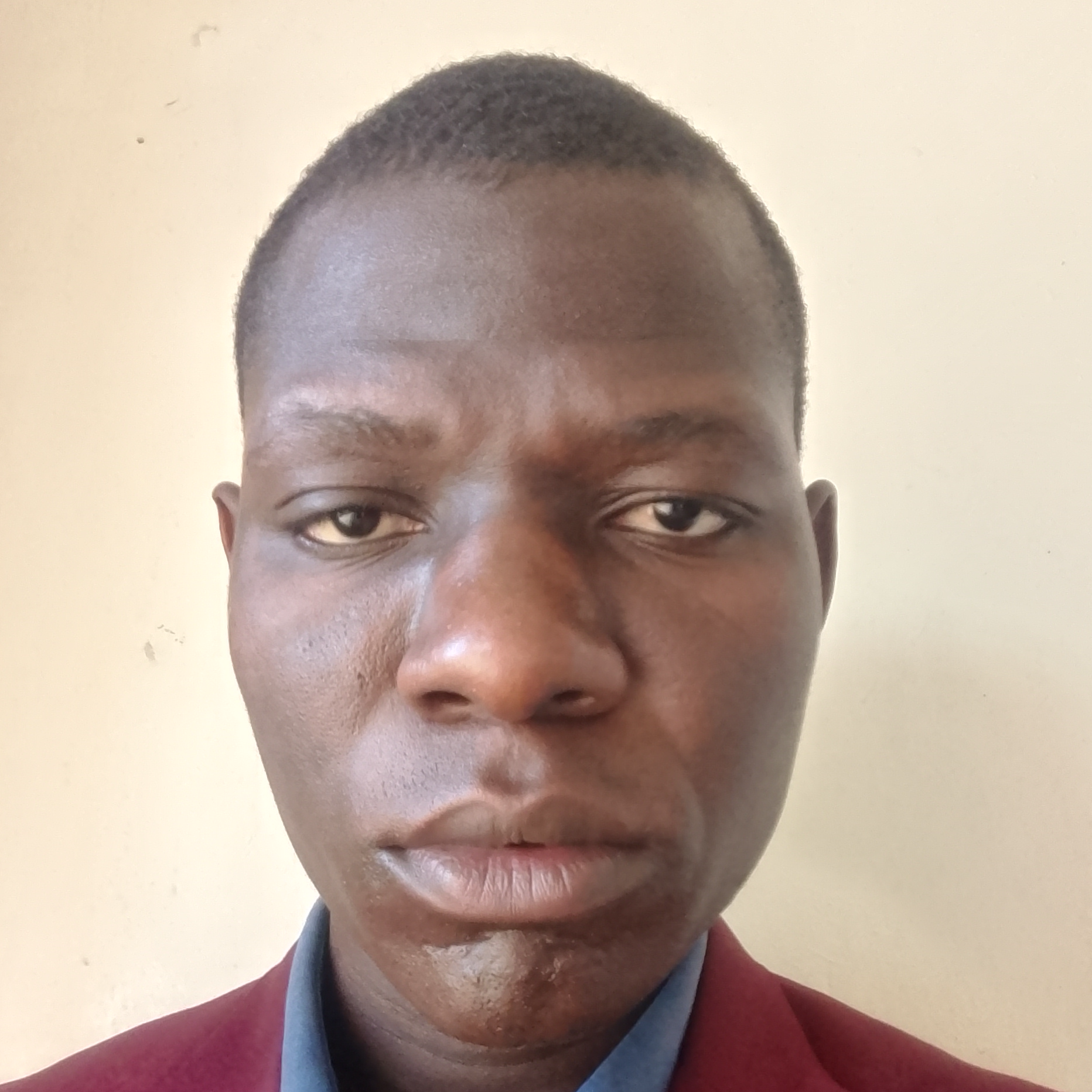MUKISA PHILEGON KANIIKE