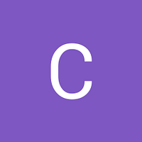Cotton University logo